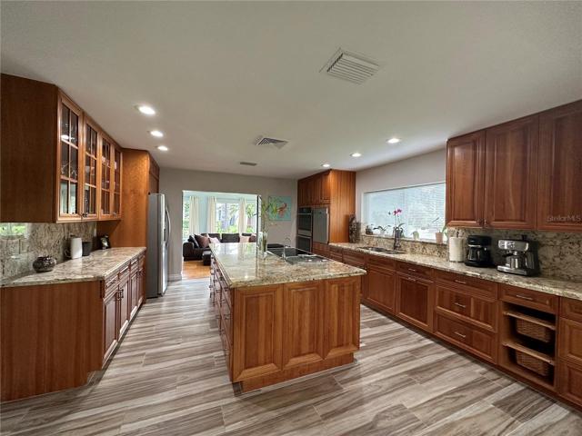 WOOD CABINETS - GRANITE COUNTERTOPS