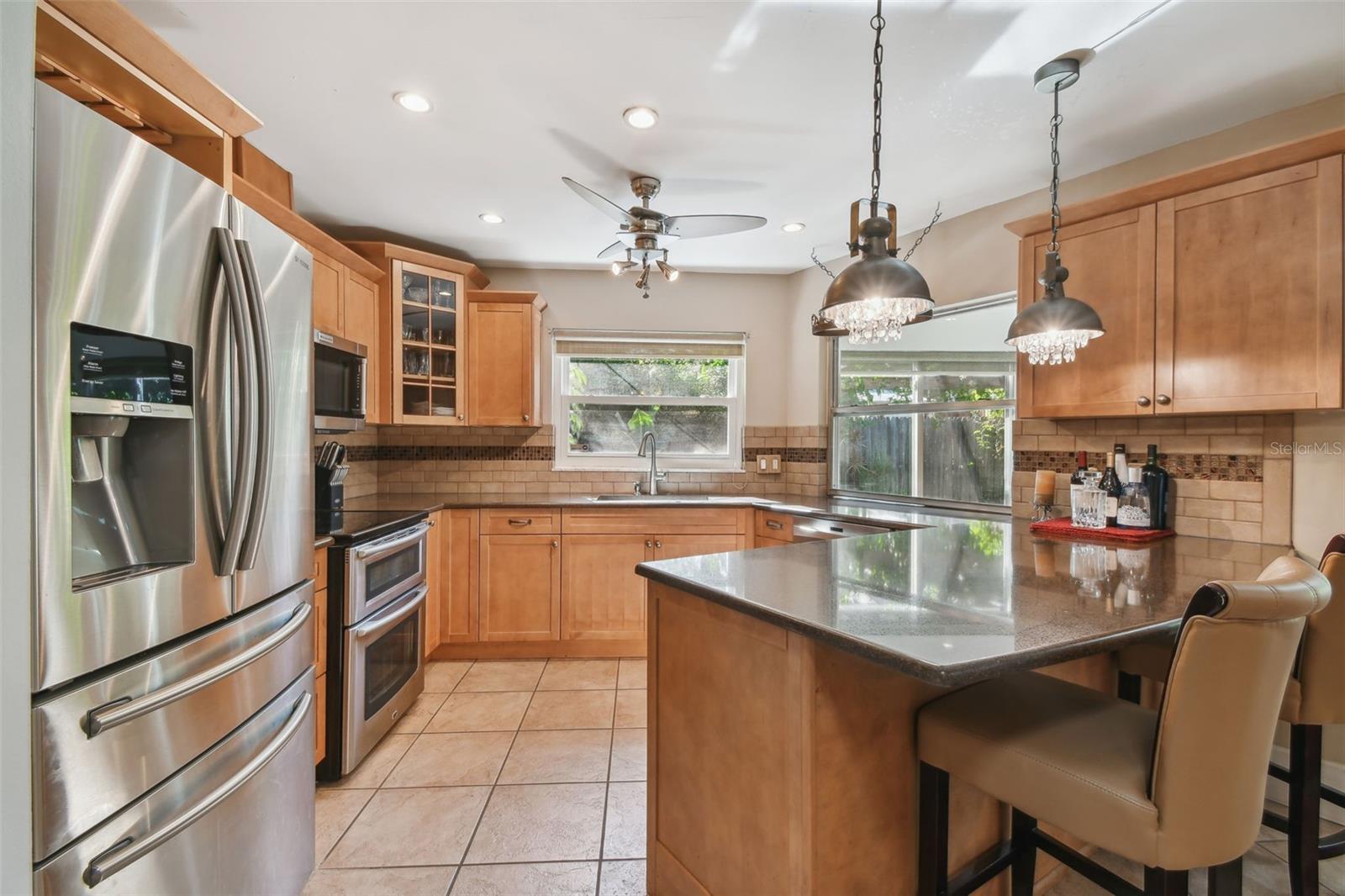 kitchen with 2 different bar areas.