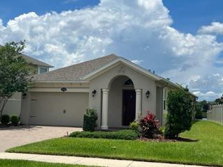 FRONT WITH PAVER DRIVEWAY