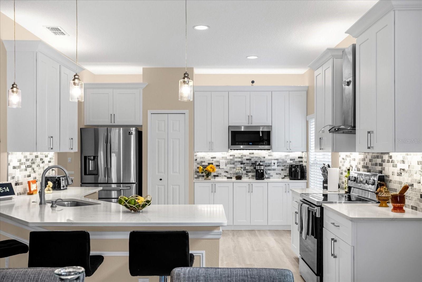 Brand New Cabinets. New backsplash. Modern Stainless Steel Appliances