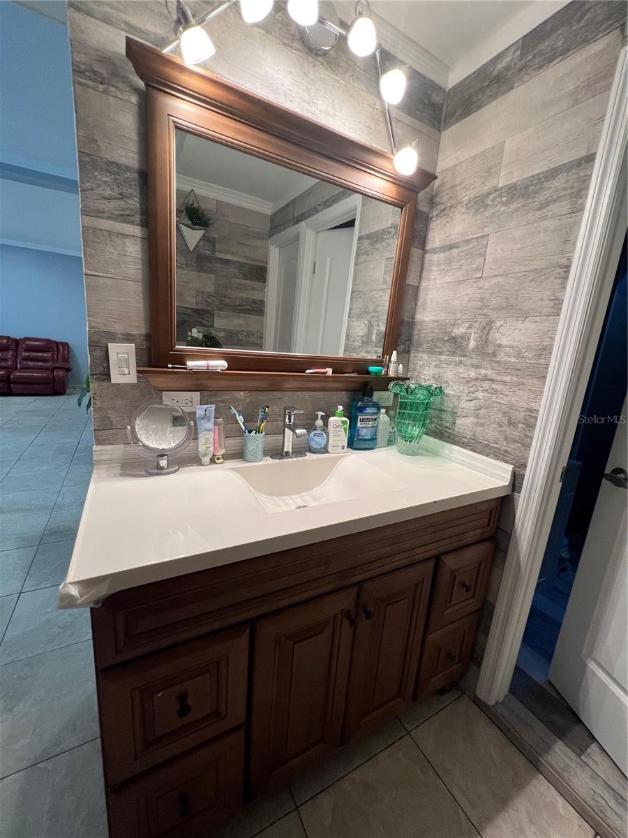 Sink outside of bathroom 3