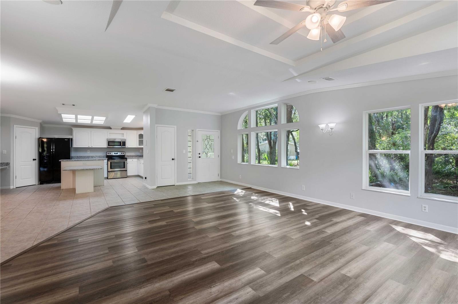 Double pane windows, vinyl plank flooring, drywall construction, tray ceiling, new ceiling fans....