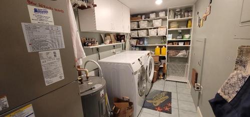 utility room with washer and  dryer