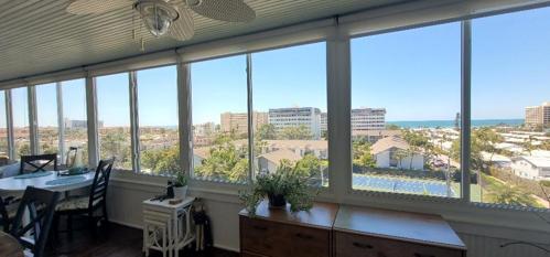 lanai with roll down blinds and fans