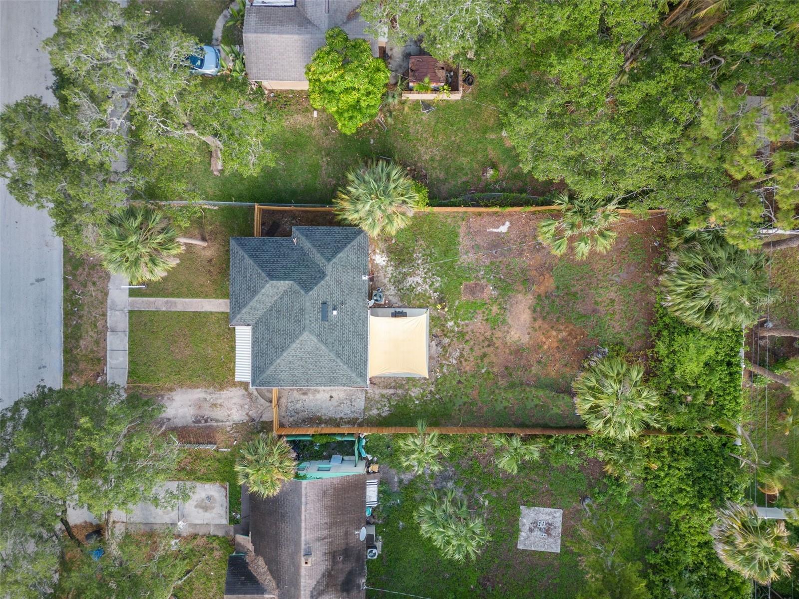 Large, fully fenced backyard