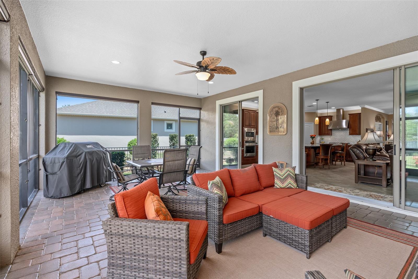 This Extended and Screened Lanai becomes a Great Extension of your Indoor Living Area