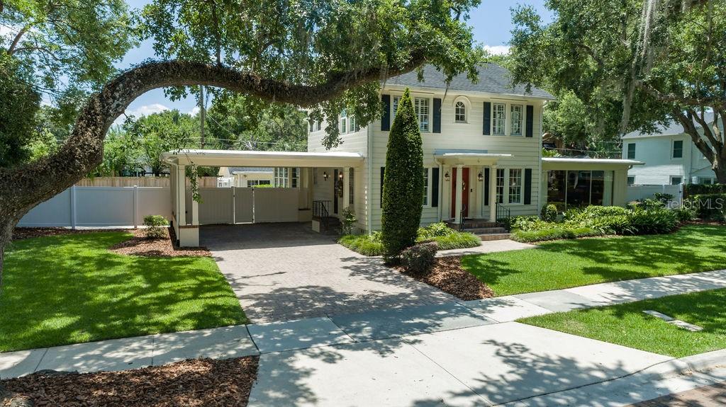 Located on a brick, tree-lined street on an oversized lot!