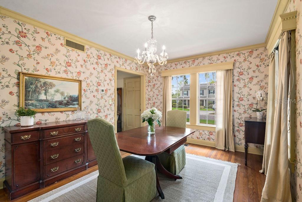 Dining room with custom wood cornices to add to the charm and character!