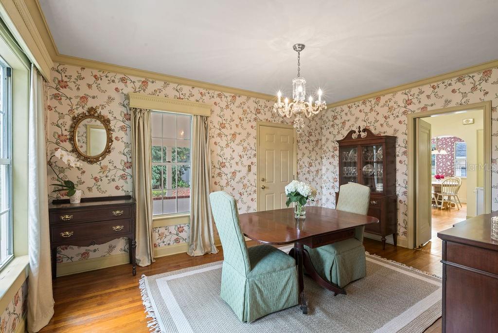 Dining room with view into the kitchen and breakfast nook