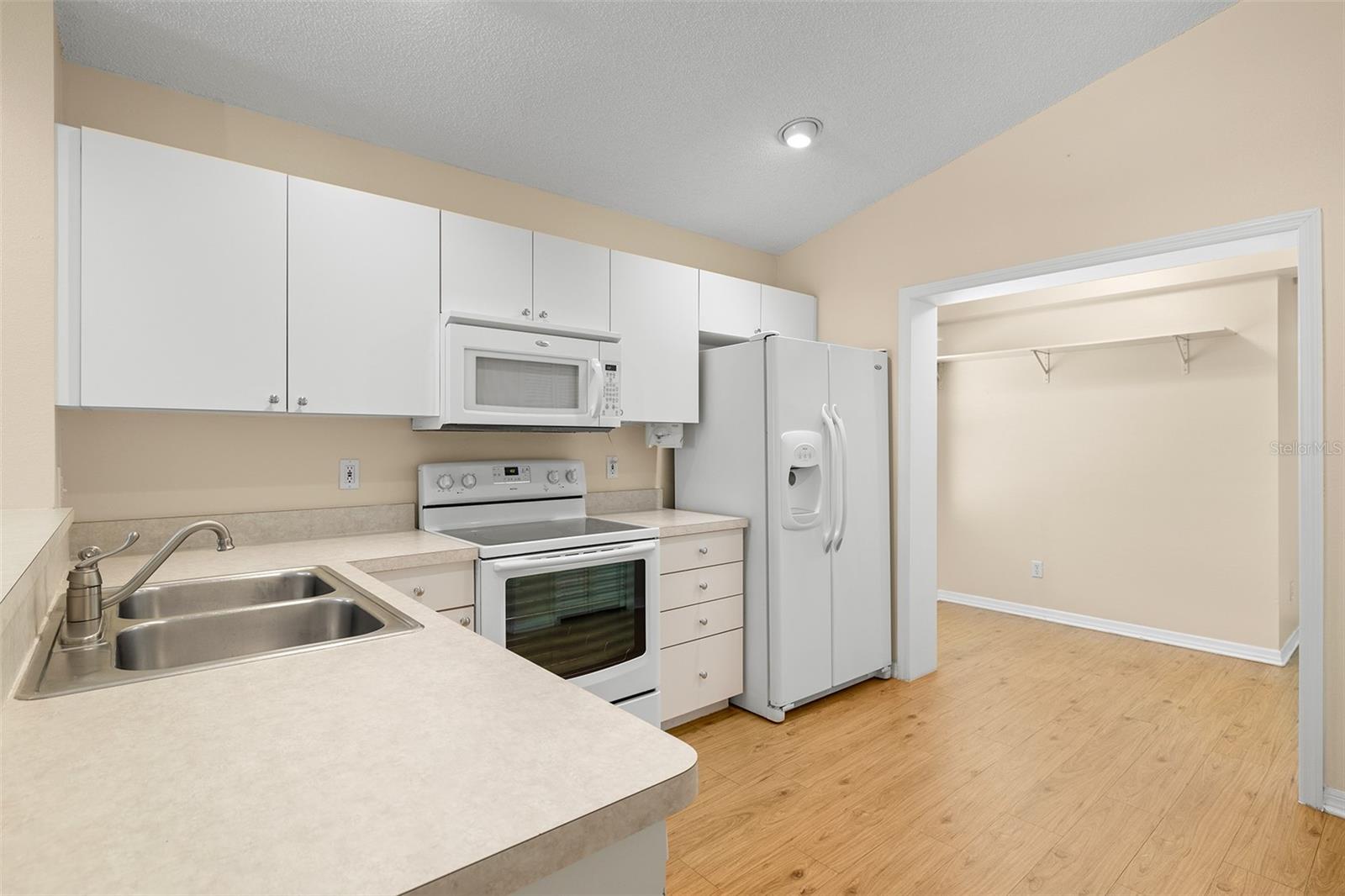 Spacious Kitchen and View of Bonus Area
