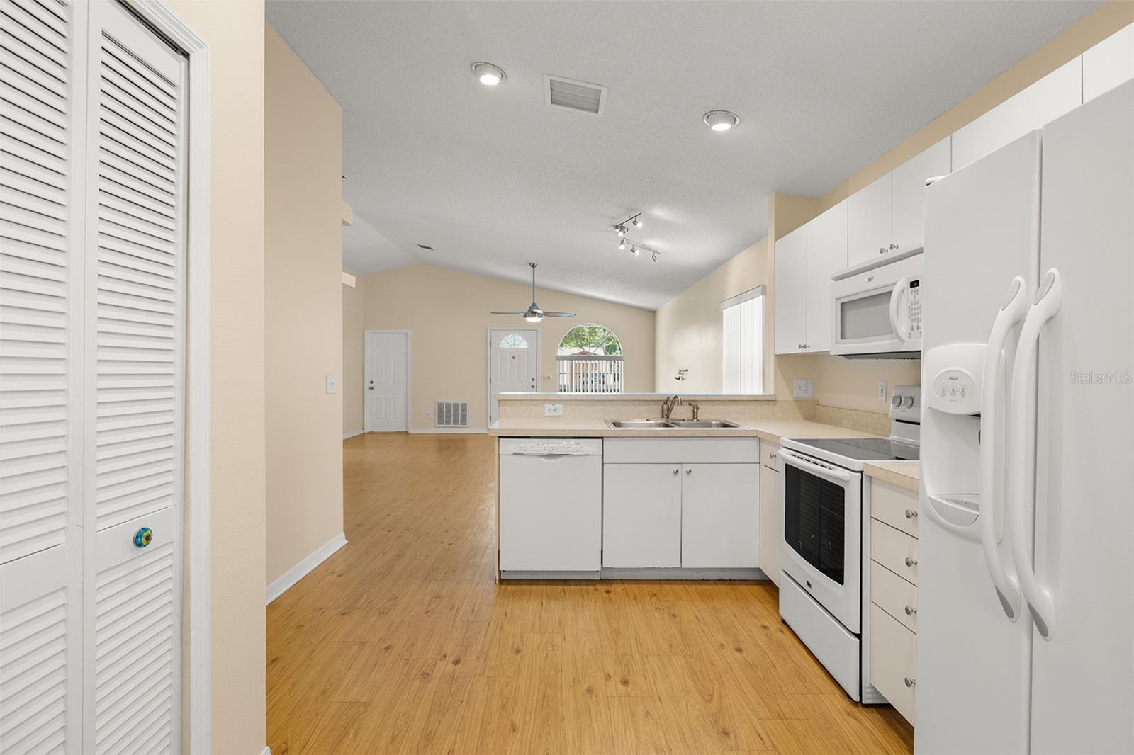 Kitchen Open to Dining &amp; Living Areas