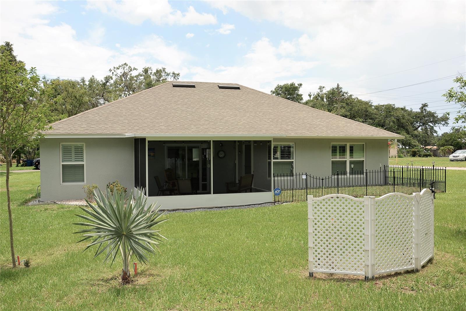 REAR OF HOME AND YARD