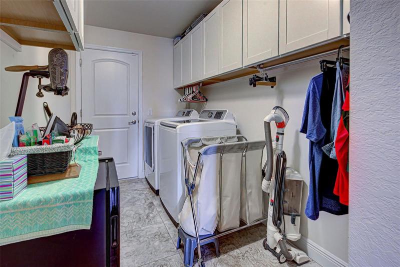 Laundry Room with lots of cabinets