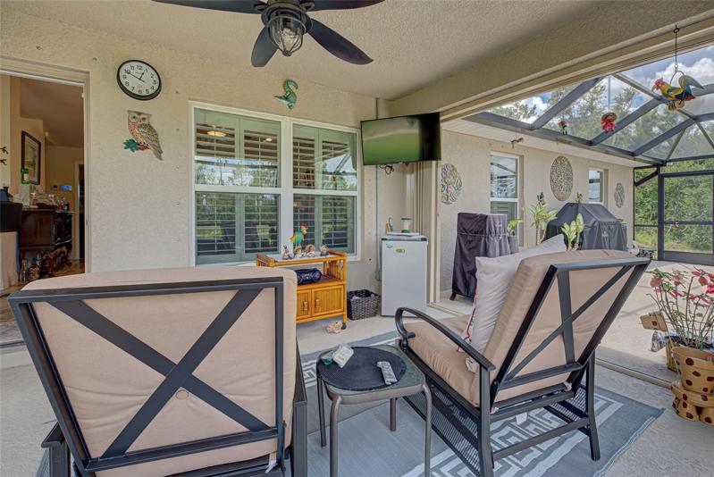 Covered patio, TV hook up, permanent hurricane shutters