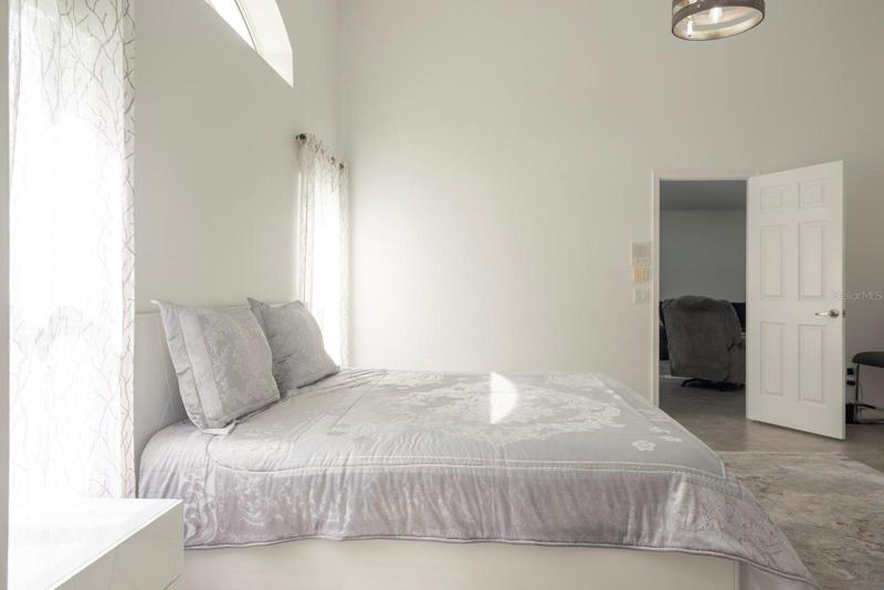 Master bedroom with paladium window overhead