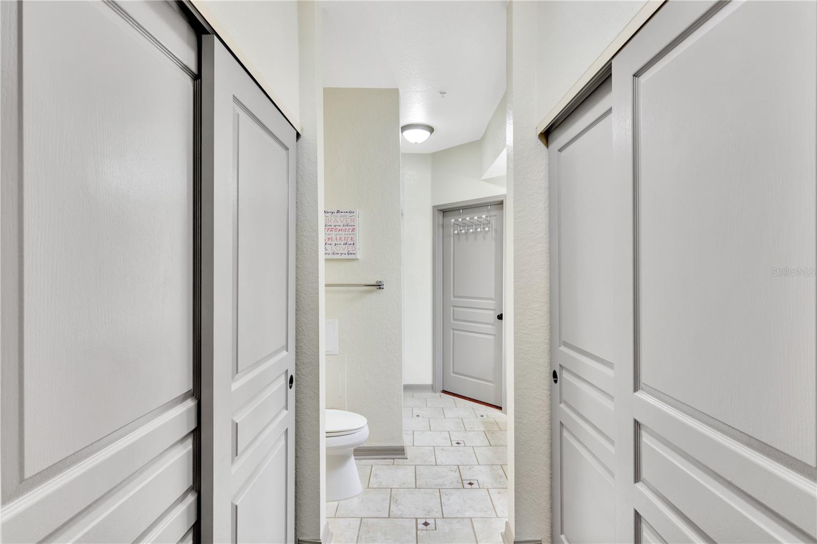 Master Closet into Bathroom