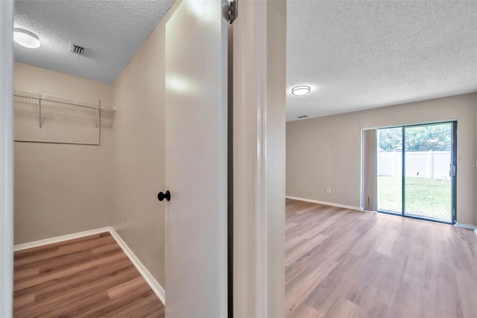 Owners suite with a large walk-in closet
