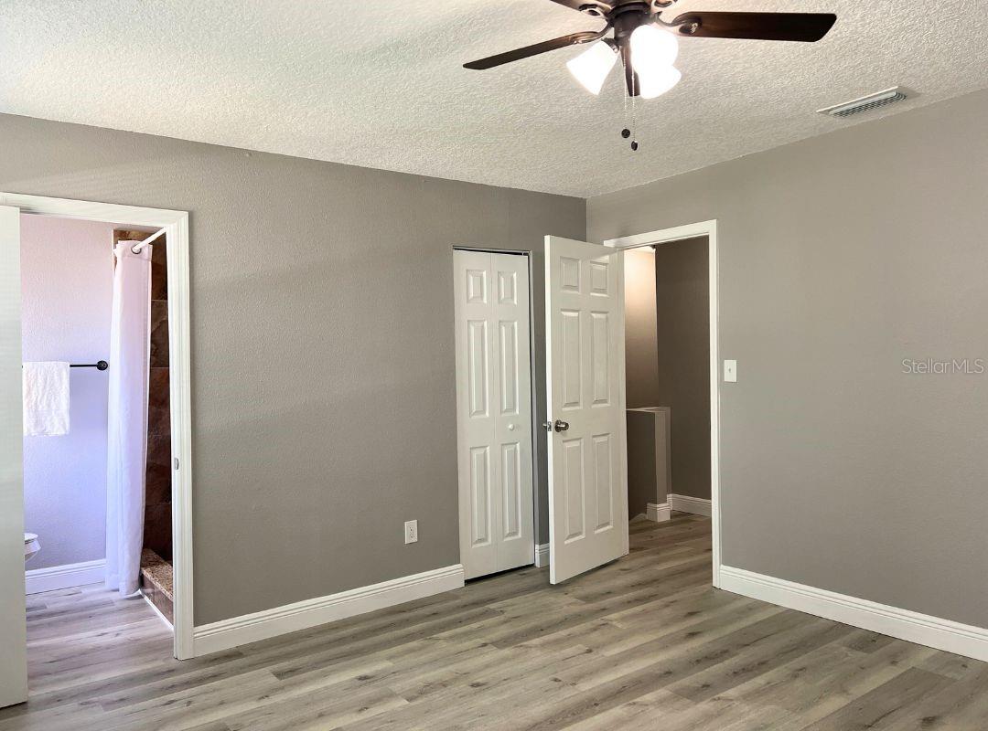 Primary Bedroom - Laminate Floors