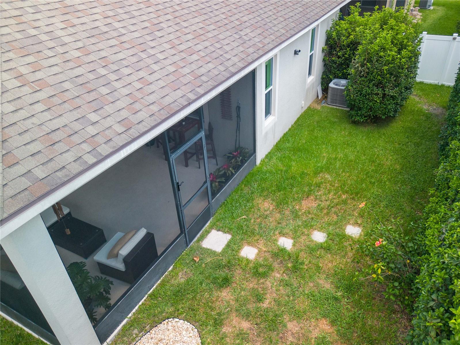 Fence-enclosed yard with an access gate on each side.