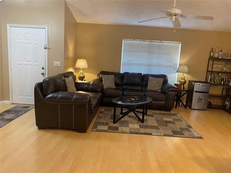 Living room as vaulted ceilings.