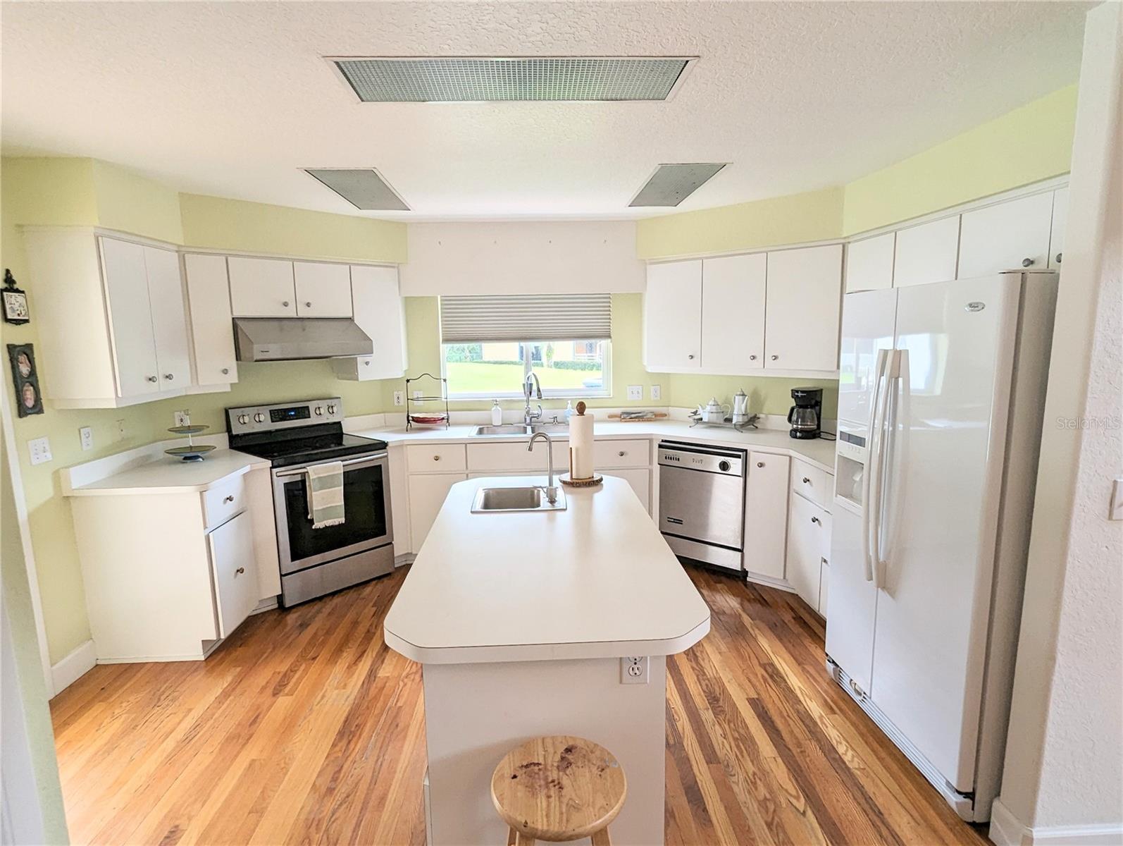 Kitchen with additional sink island.