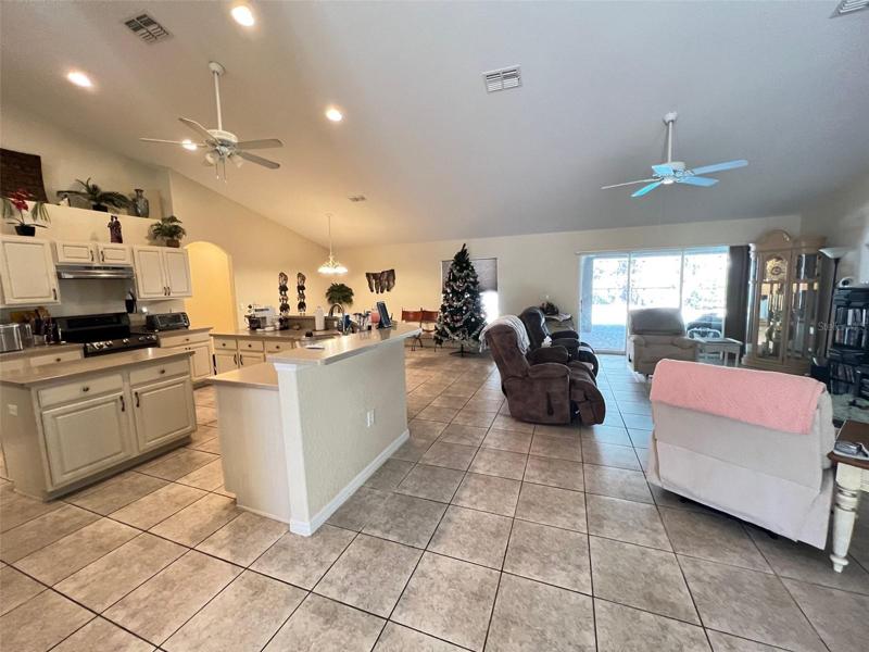 From foyer, kitchen with Great room