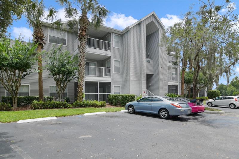 This charming and inviting third-floor condominium is nestled in the highly sought-after **GATED** lakefront community of Regency Park in beautiful Lake Mary!