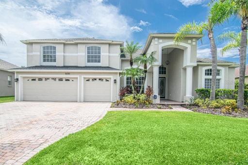 Welcome home to this beautifully renovated home in the gated community Ashington Reserves in sought after Tampa Palms!