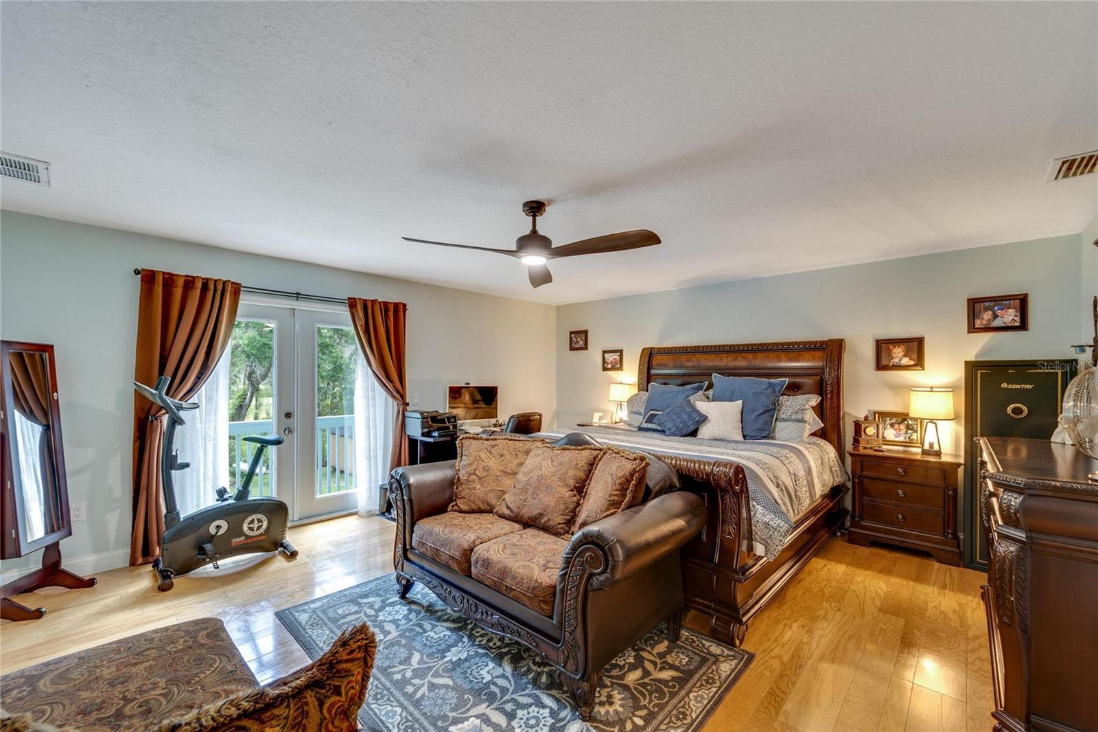 Owners Suite - french doors that lead to balcony