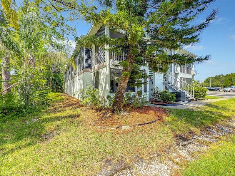 Unit Overlooks Canal & Wooded Area