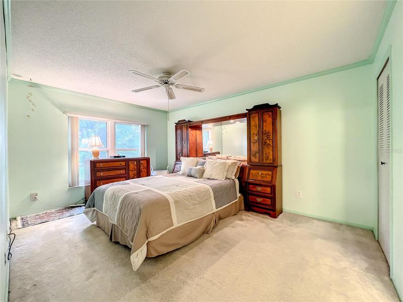 Master Bedroom w Canal Facing Windows