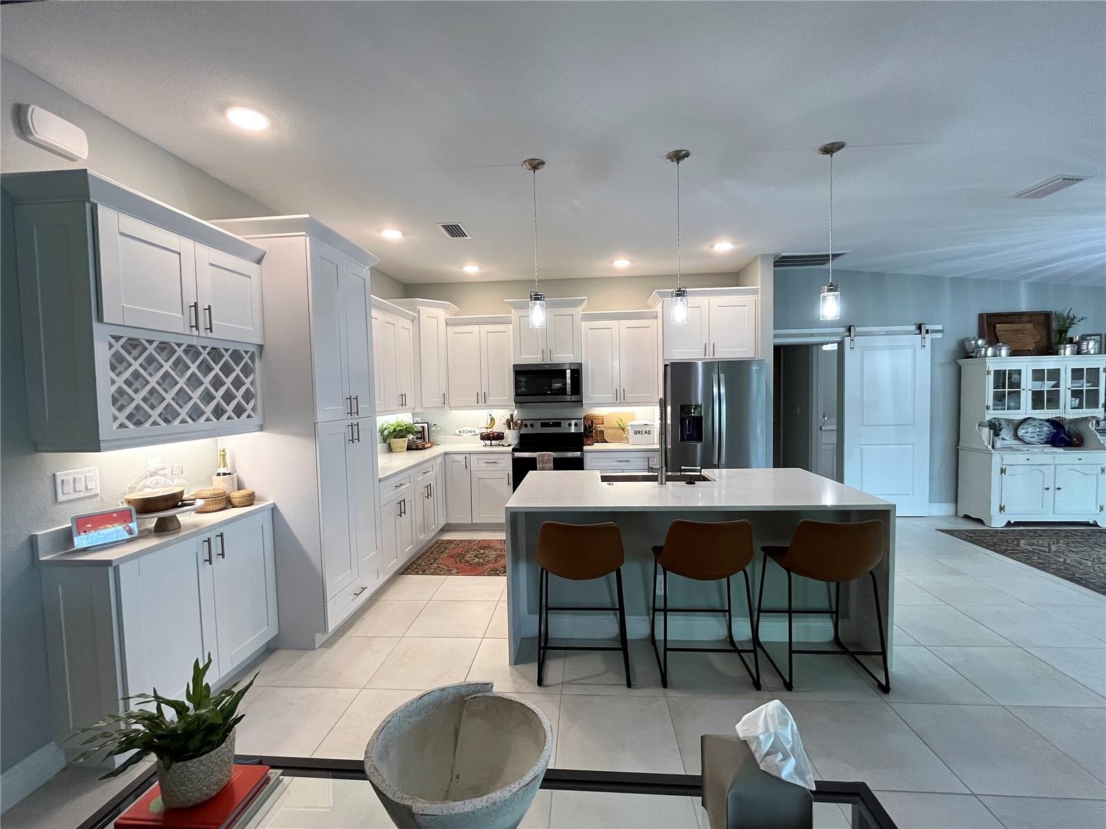 Kitchen view, wine storage bar area