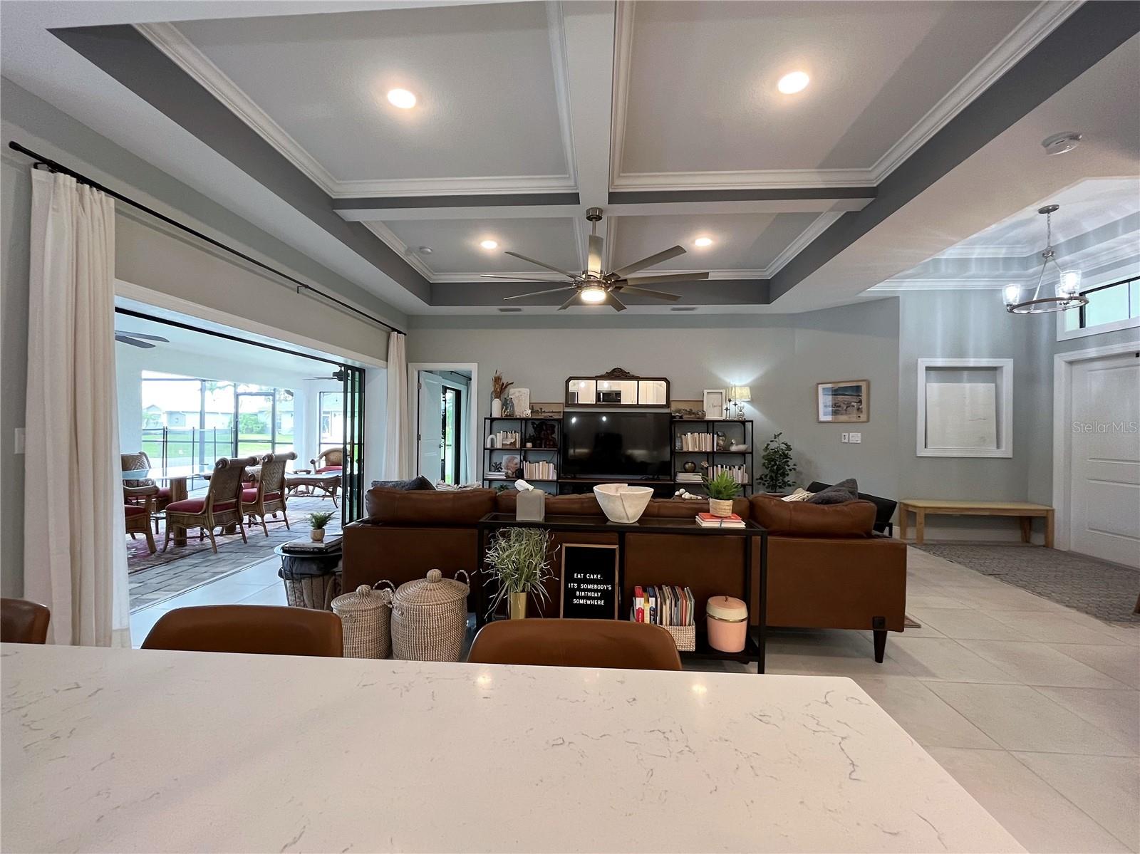 Bright Kitchen with quartz counters, island and lots of storage
