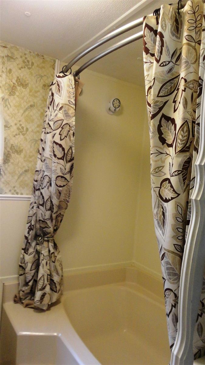 Soaking tub/shower combination