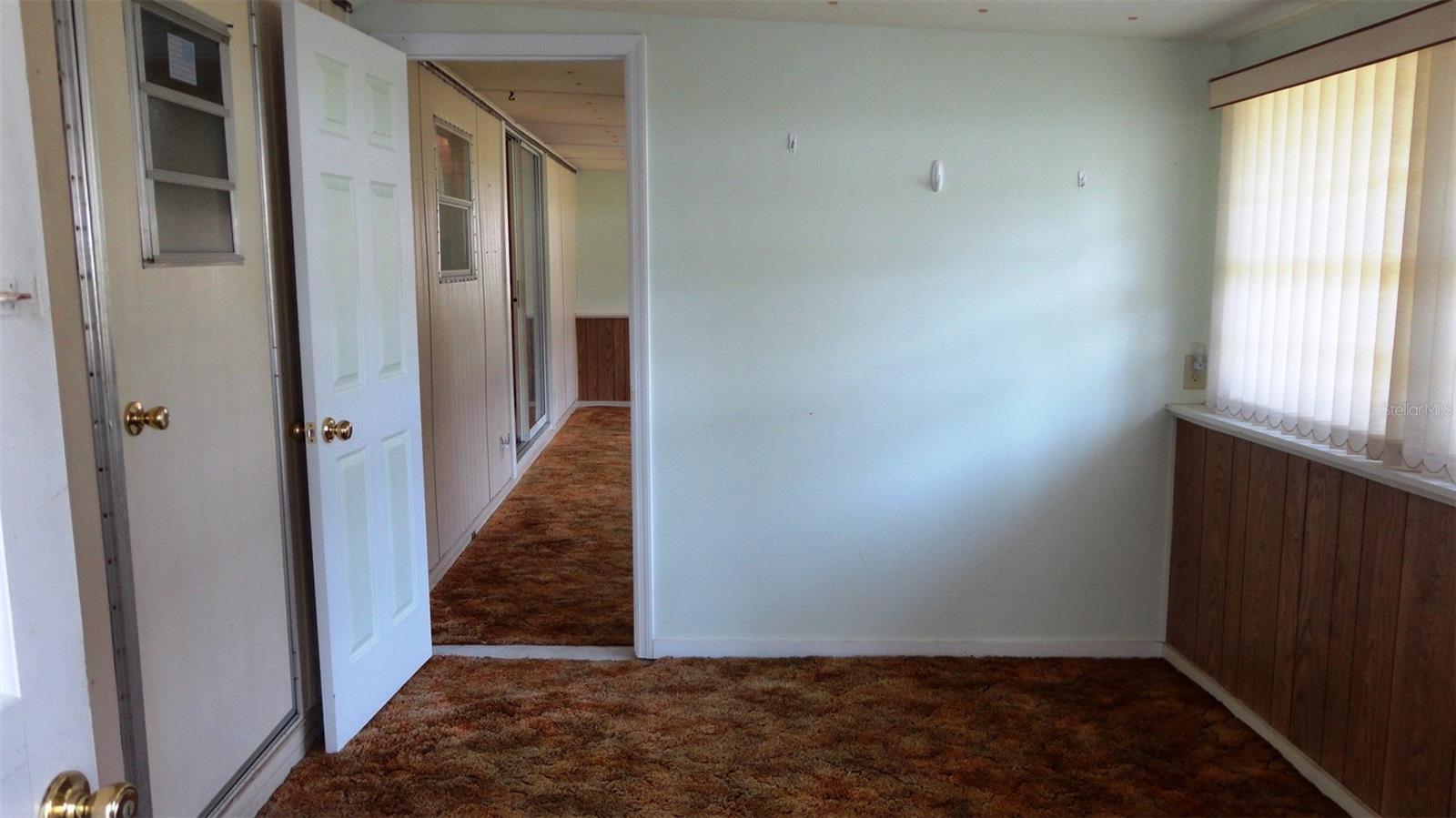 Finished enclosed porch has 2 separate rooms
