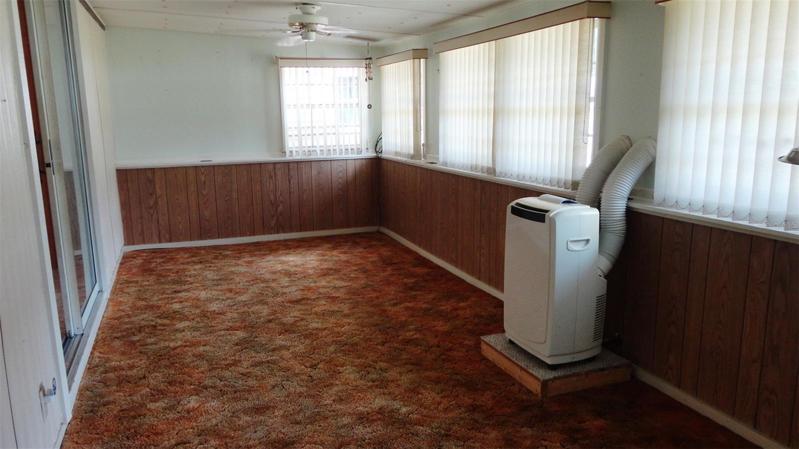 Finished enclosed porch can be accessed from dining area