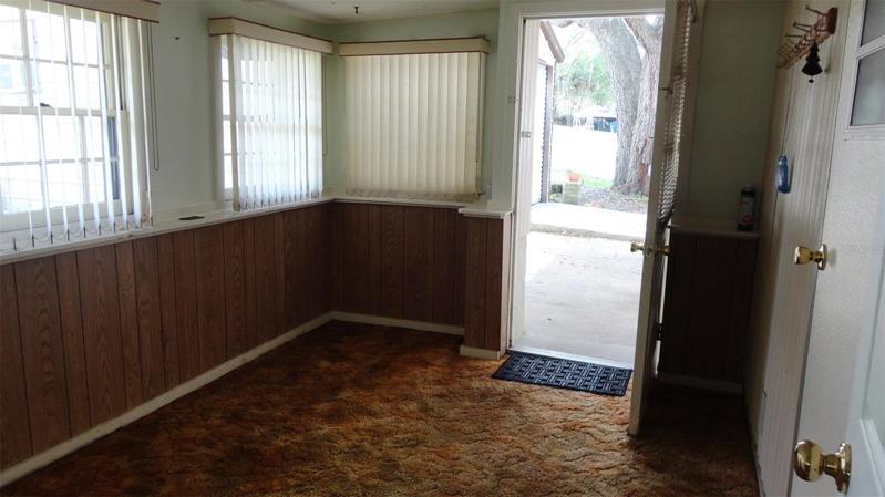 Back door to house can be accessed through finished enclosed porch.