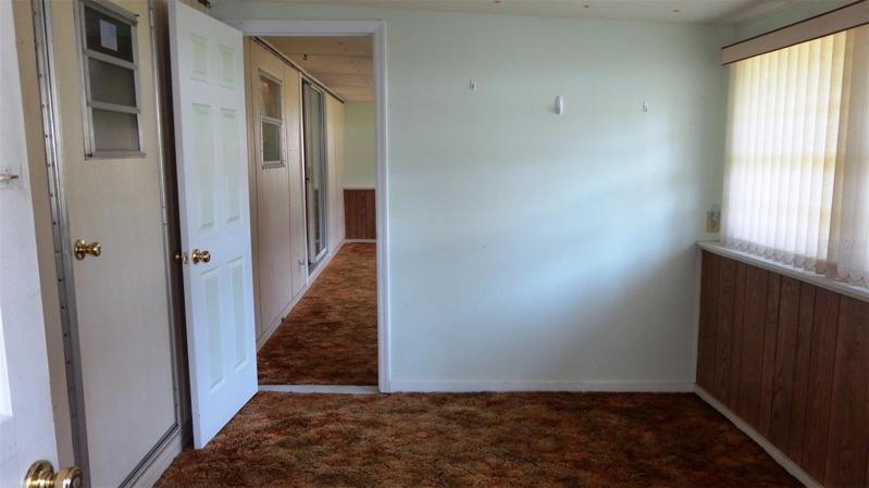 Finished enclosed porch has 2 separate rooms
