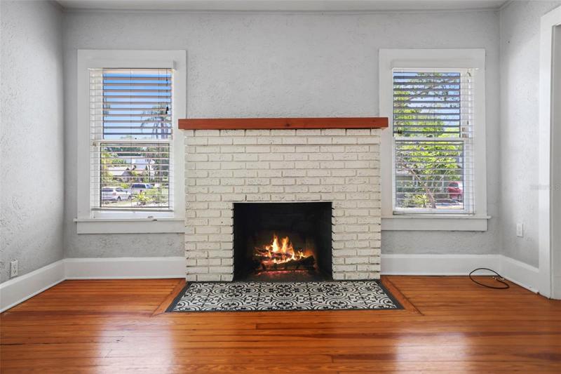 Fireplaced Living Room with beautiful Hardwood Floors