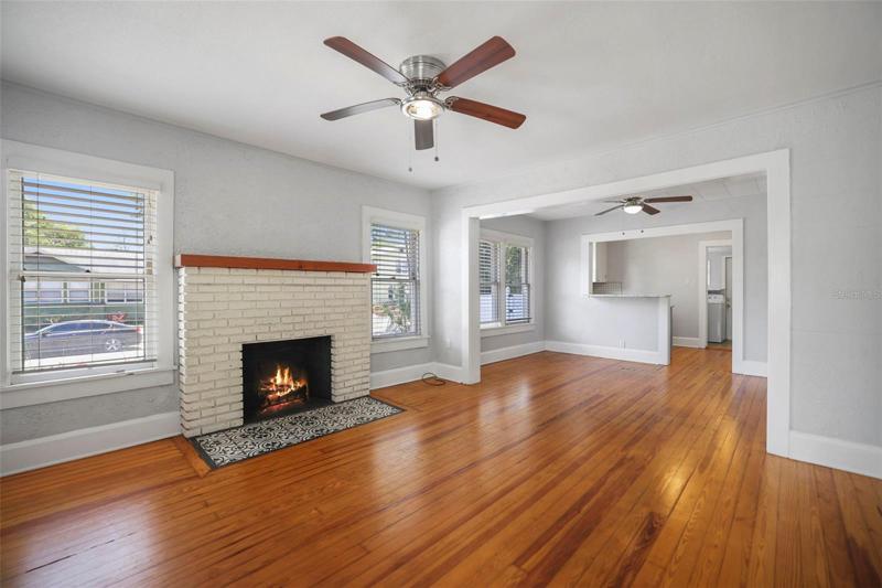 Fireplaced Living Room with beautiful Hardwood Floors