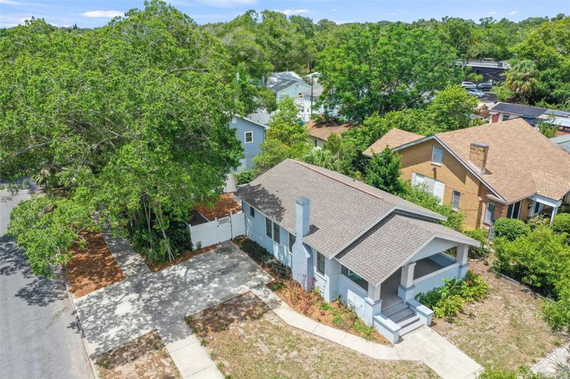 View of Single Family home, Building 2 is behind on the left upper part of the photo behind the beautiful shade trees