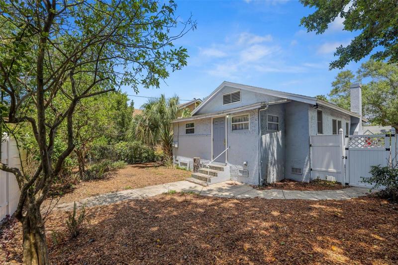 Backyard, completely fenced of single family home.