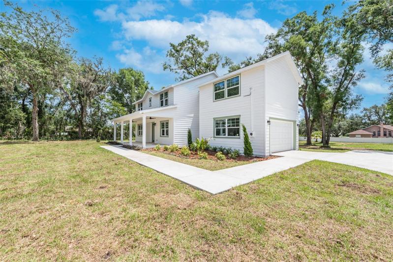 Home faces west, enjoy the porch for sunset views