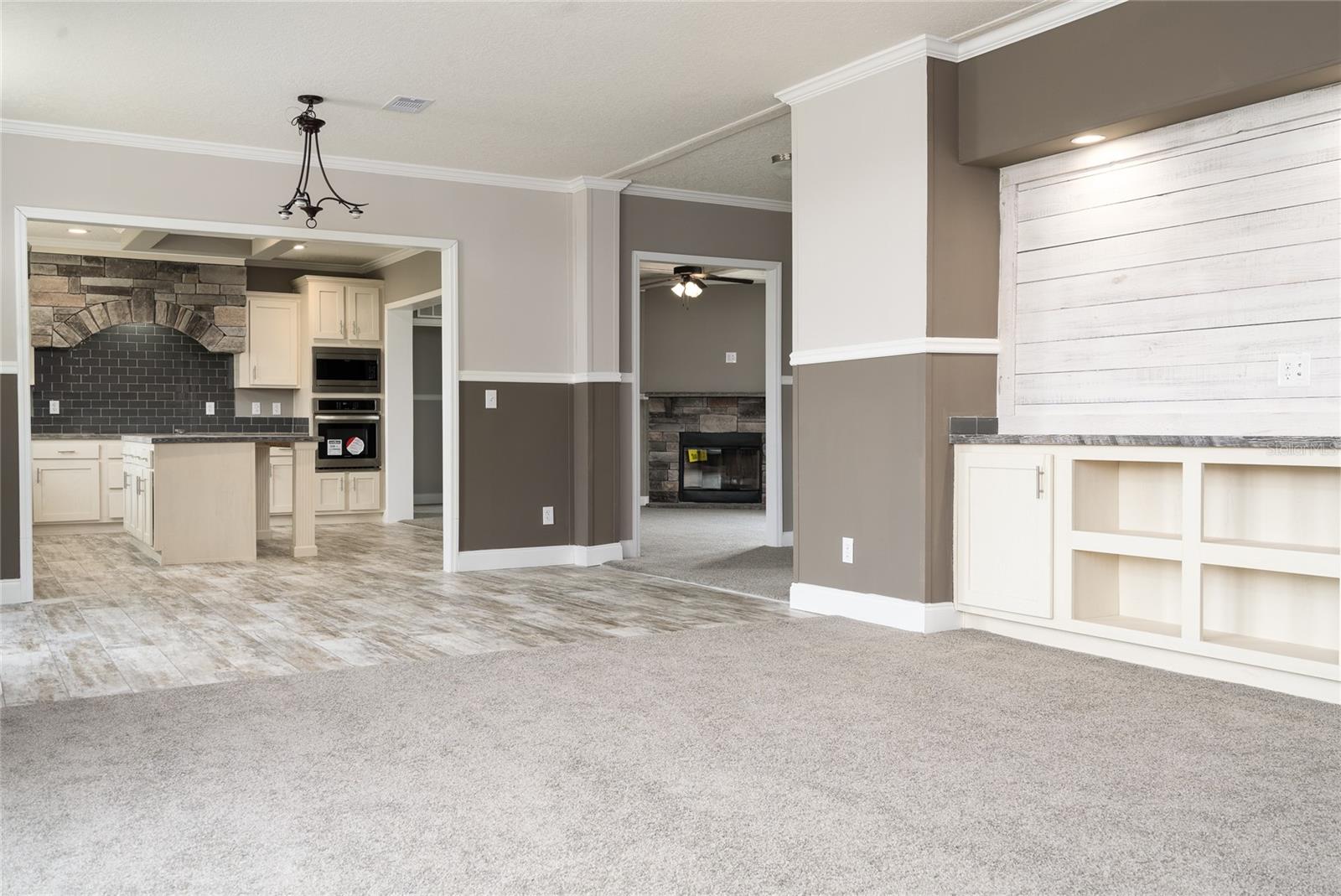 Main living area towards dining room and family room (afar).