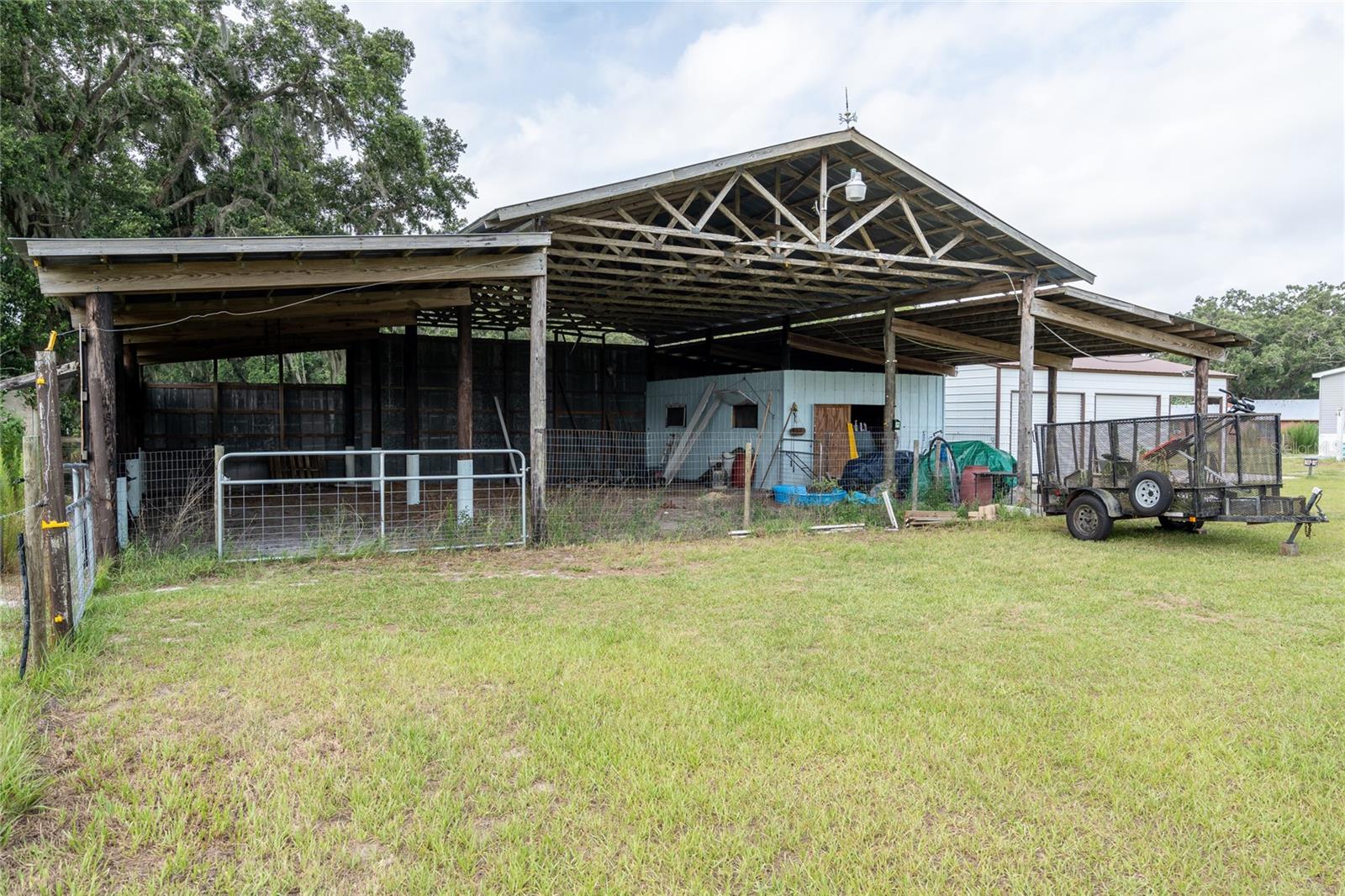 Front of open barn.
