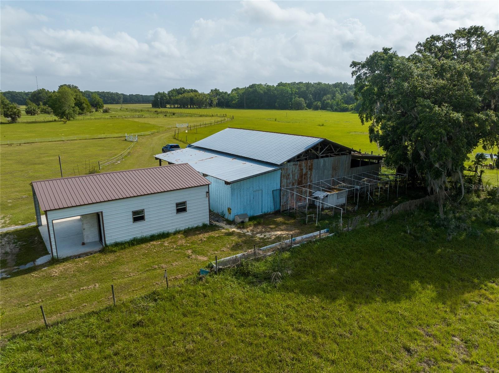 Rear of buildings. The chicken estate is behind the barn.