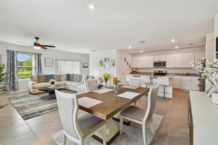 Dining table and living area open floor plan