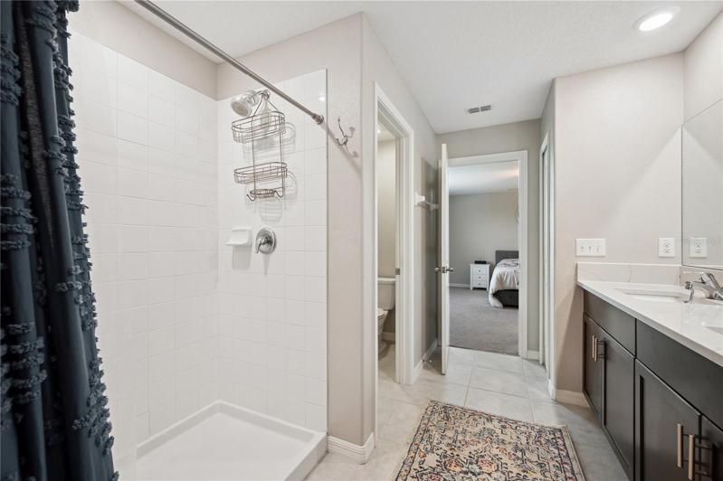 Primary bathroom with walk-in shower
