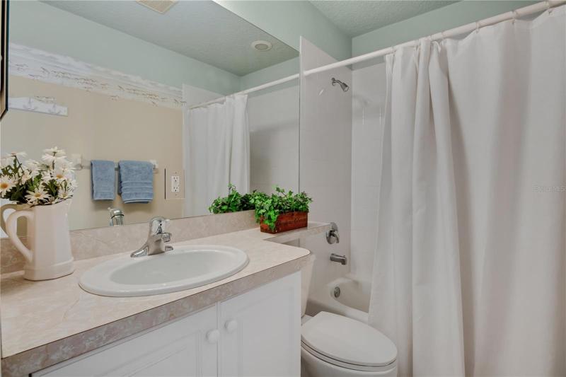 Second bathroom with shower/tub combo