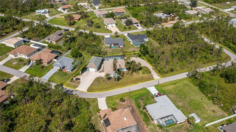 Oversized .55 acres (2 lots) WOW!!! House has a new roof from 2022!